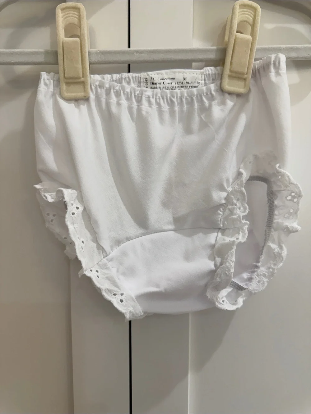 Pair of IC COLLECTIONS White Ruffle Diaper Covers w/ “C” Floral Monograms